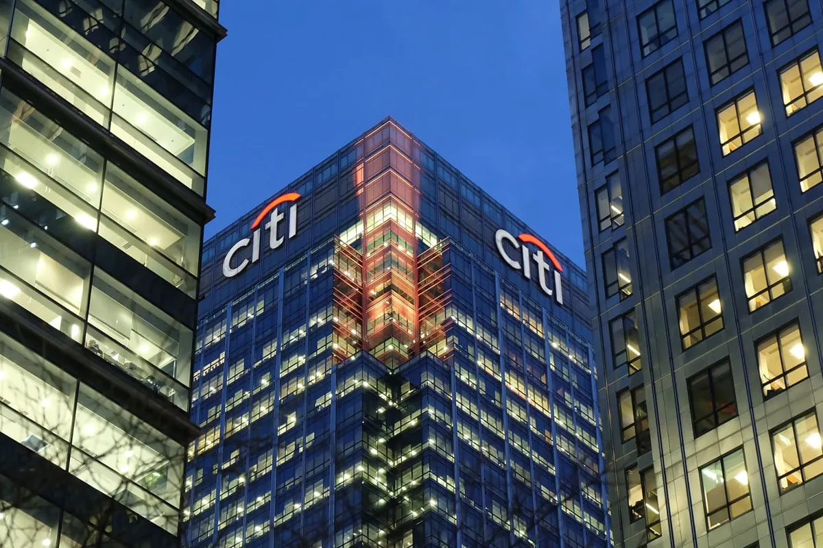 Citibank building with 7.00% rate announcement highlighting lower lending rates and financial optimism in 2025.
