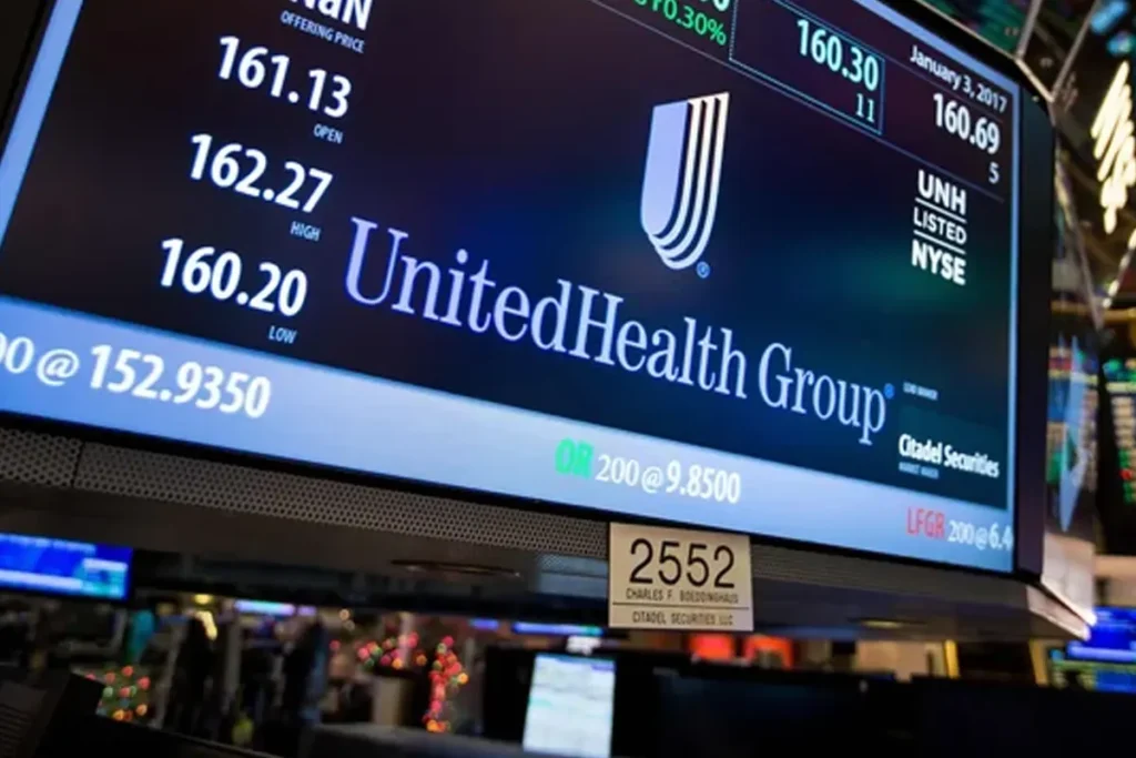 US healthcare stocks visual showing a business leader analyzing upward-trending financial graphs and sector growth outlook.