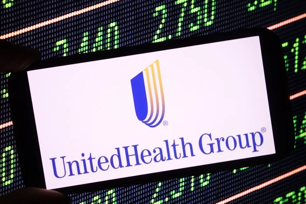 UnitedHealth Group growth 2026 visual showing an executive reviewing rising financial graphs and strong business projections.