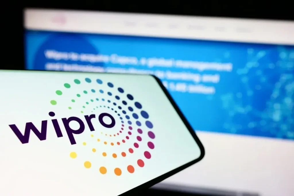Wipro Q2 2025 earnings report showing slight profit increase, revenue growth, and improving large deal momentum in India’s IT industry.