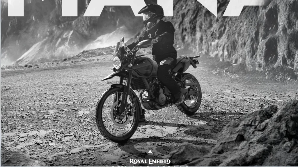Himalayan 450 Mana Black Edition displayed at EICMA 2025 featuring matte black finish, off-road accessories, and Sherpa 450 engine.