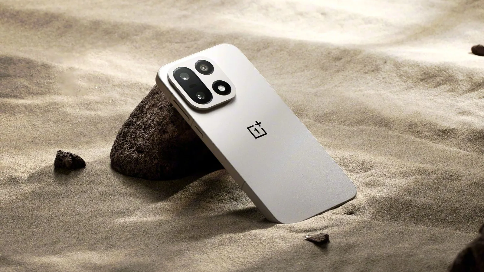 OnePlus 15 review showcasing the phone’s sleek Sand Storm design, triple rear camera setup, and bright 165 Hz display.