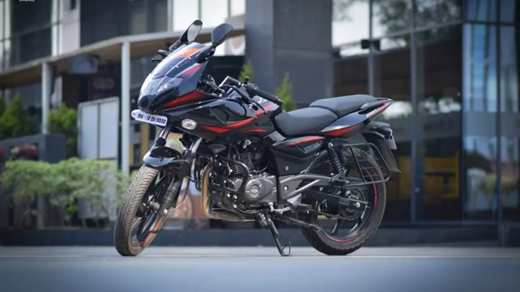 Close-up shot of updated Bajaj Pulsar 220F 2025 features including new graphics and ABS setup.